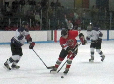 Tromiczak charges during delayed penalty.