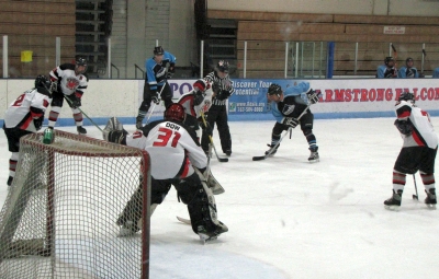 Dow (31) awaits the faceoff by Hilden (17).