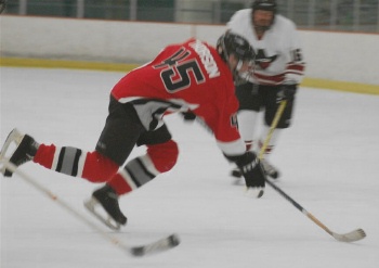 Center Doug Thorson (45) draws a tripping penalty in the second period.