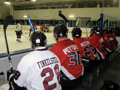 The Spiders’ newest winger, Steve Finkelstein (28), discusses second-period strategy.
