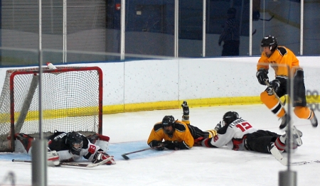 Fransen (83) makes a lunging save on a diving and/or leaping Gold Rusher.
