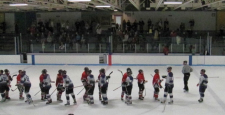 The crowd salutes, and celebrates a great Spider season.