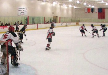 Brian Dow (5) watches the action come into the zone.