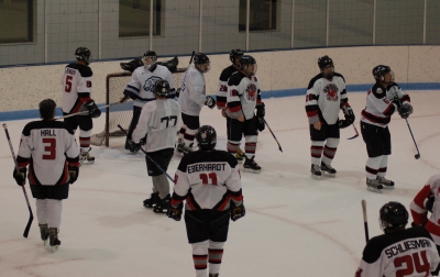 The Spiders celebrate the win after the Oct. 13 game vs. the Fighting Saints.