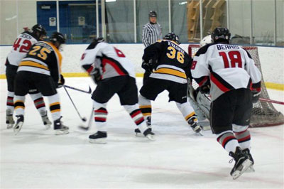 Ben Tesch (42) Jim Maietta (66) scramble in front of the Chickens’ net following and Marc Berris’ (18) pass to the slot.