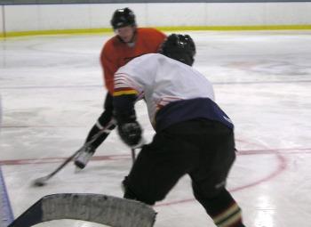 Cory Vandenberghe defends against Tim Stalpes.