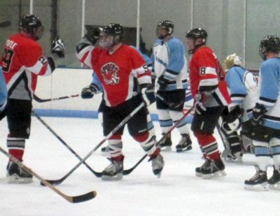 Pellicci (50) celly, with Tuttle (29) and Schlais (88).