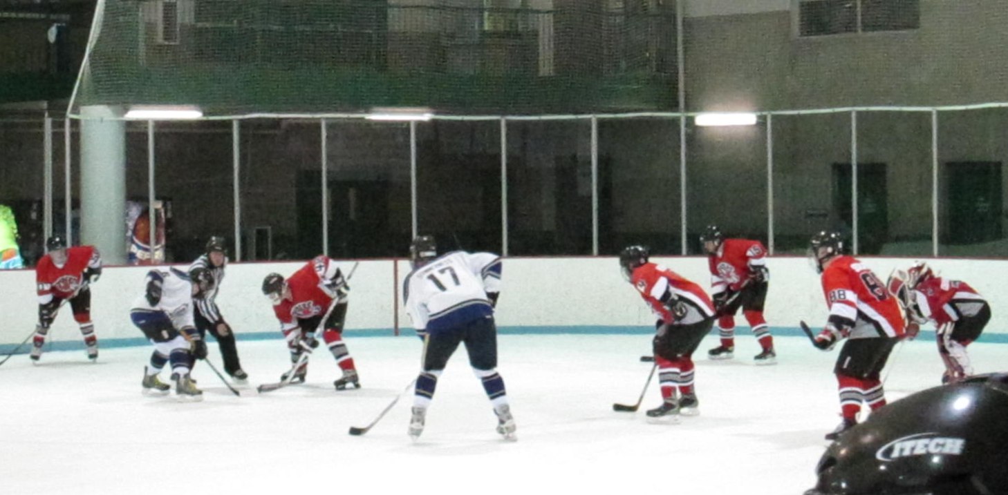 Johnson (42) takes a faceoff.