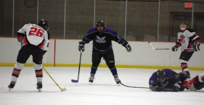 LaCosse (26) and Vesall (27) in a staredown contest.