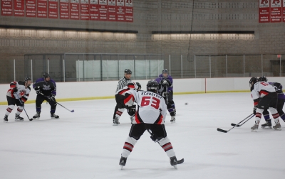 The Sages line on the faceoff: Freed (55), Schroeder (63) and Schuster (5) support Wahlberg (11).